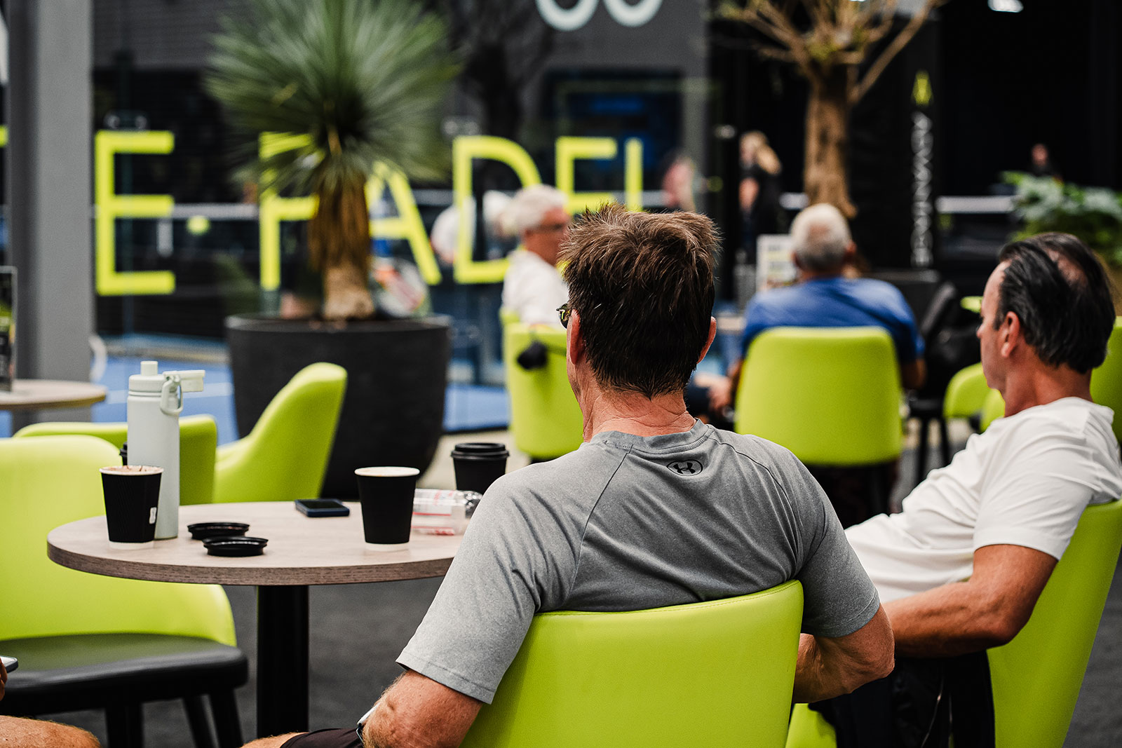 Lounge seating beside the courts